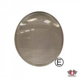 Headlamp lens, assymmetrically, with E-mark