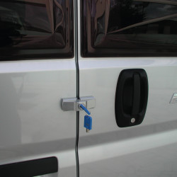 Universal surface-mounted lock for sliding and rear doors