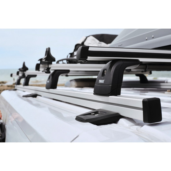Longitudinal rails including mounting kit for roof racks with awning package