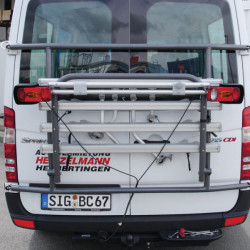 Lighting strip for rear axle spring