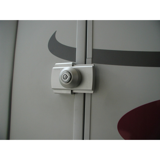 Additional and surface-mounted lock set for motorhomes