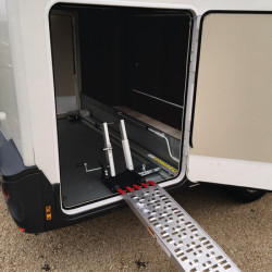 Loading aid for bicycle/scooter in rear garage